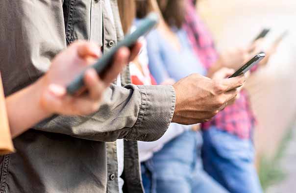 close-up-phones-in-hands