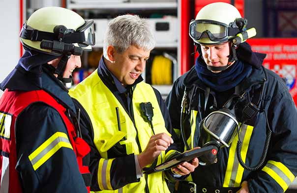 firefighters on tablet