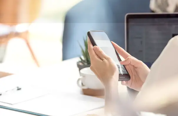 person-on-phone-at-desk