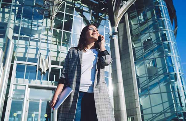 woman-on-phone-outside-building