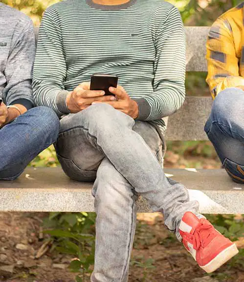 hero-man-on-phone-bench